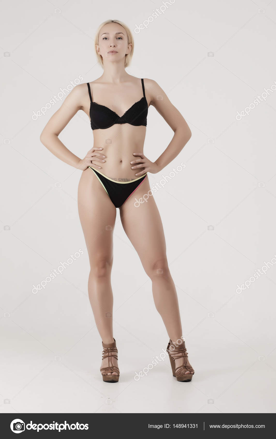 Athletic woman in underwear Stock Photo by ©nikolodion 148941331