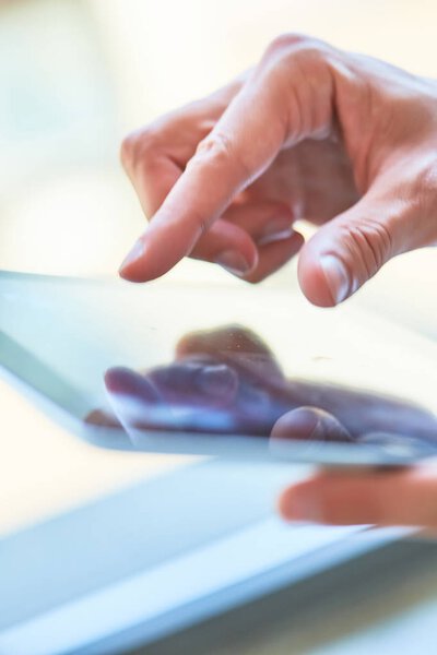 hand of businessman using  tablet