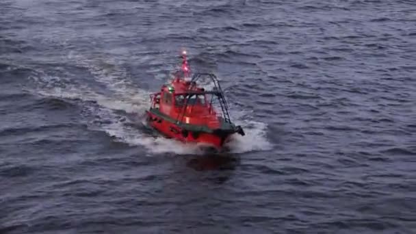 Small red fast pilot motor ship from Riga port close view — Stock Video
