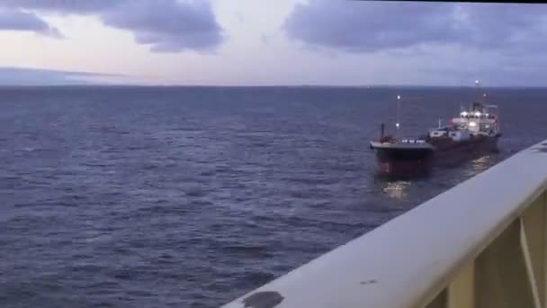 Cargo ship sails in sea approaching tanker to receive fuel — 비디오