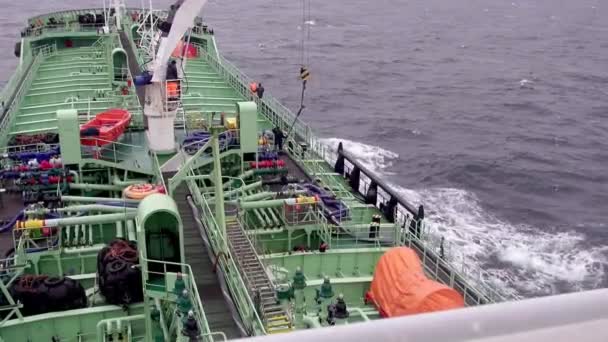 Sailors carry out repairing work on deck sailing on open sea — 비디오