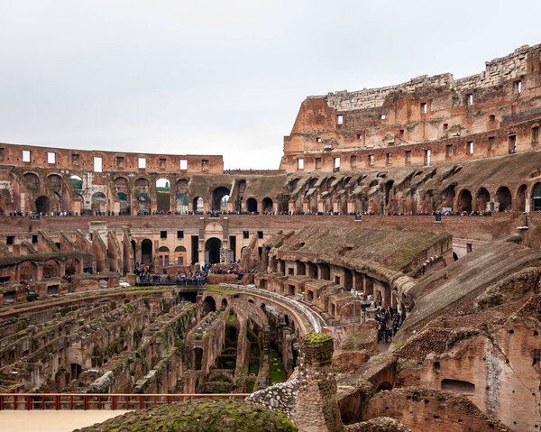 Rome Italy. Interior of the Colosseum, famous for its shows with gladiators in the Roman Empire. View of the stands for the spectators and the underground rooms, from where lions and tigers came out.