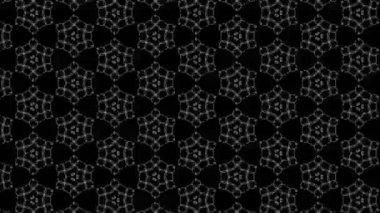 Siyah beyaz desenli, stroboskopik ve hipnotik etkiye sahip grafiksel desen, boyutu artarken ve sonra 16: 9 video biçiminde küçültürken,