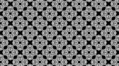 Siyah-beyaz grafiksel desen, stroboskopik ve hipnotik etkiye sahip. Boyutu artarken ve sonra küçültürken..