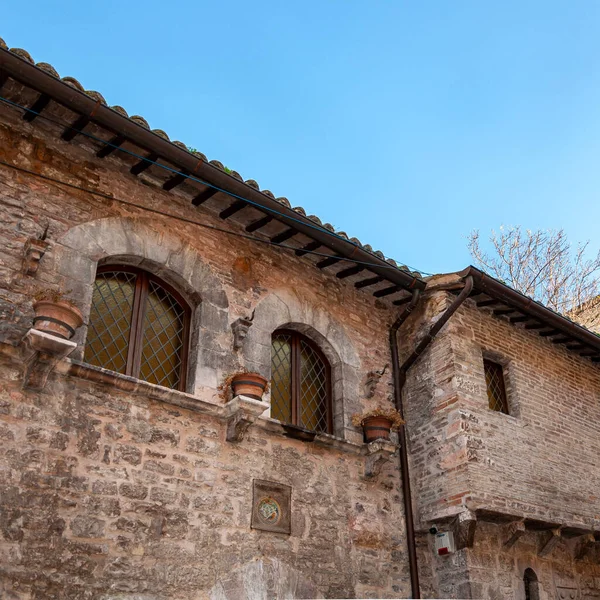 Assisi, the city of peace, Italy. UNESCO World Heritage Site, the birthplace of Saint Francis. Medieval house detail in the historic center.