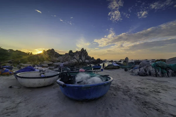 Traditional boats beside Lighthouse at Ke Ga, Binh Thuan, Vietnam.