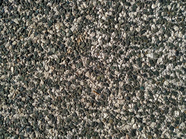 Texturizado grunge padrão áspero encontrado em telhas de chão ou parede feita de pedra de cimento em preto branco e cinza cores como um material natural papel de parede fundo — Fotografia de Stock