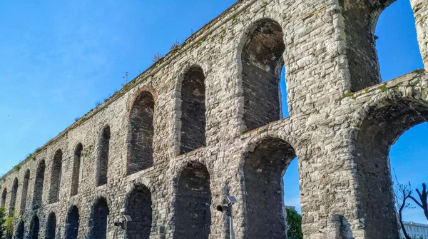 Ancient old style aqueduct made of stone with many pillars as national and cultural heritage of the world