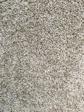 Ilık ve yumuşak halı, halı ya da yün battaniyesi iç dekorasyon için doğal doku malzemeleriyle tekstil endüstrisinde üretilir.