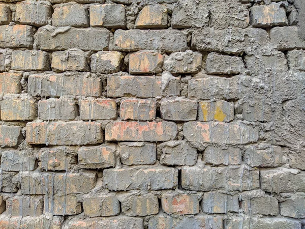 Alte Ziegel Textur. Ziegel mit Zement Hintergrundbild Foto für Design. Vintage-Mauer mit Ziegelsteinfassade. — Stockfoto