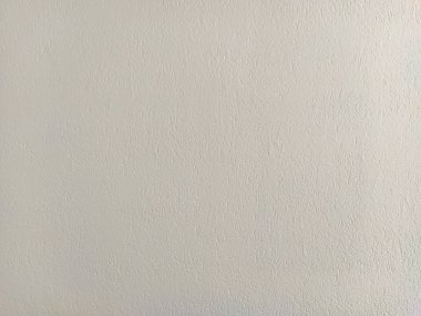 Duvarın kabataslak beyaz yüzeyi, iç veya dış duvar arkaplan kirli duvar kağıdı