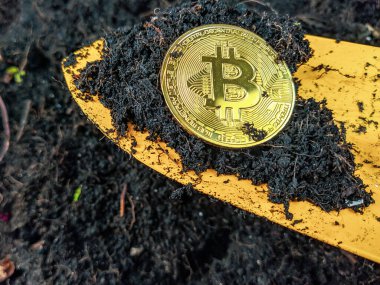 Madencilik bitcoin 'leri, kripto para birimlerine yatırım yapmak için kürekle topraktan bitcoin çıkarmanın bir metaforudur.