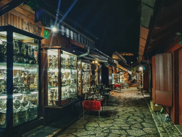 Sarajevo oriental market street during night when all the shops are closed and cozy store lights are around on Bascarsija.