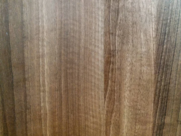 Pannello in legno marrone dall'aspetto naturale utilizzato per porte, pavimenti, scrivanie da tavolo e altre coperture superficiali, con motivo in legno naturale — Foto Stock