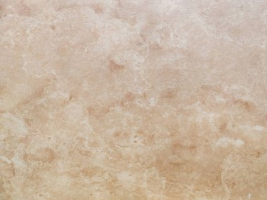 Ev iç tasarımında kullanılan seramik fayansların bej rengi ve ilginç bir arka plan duvar kağıdı.