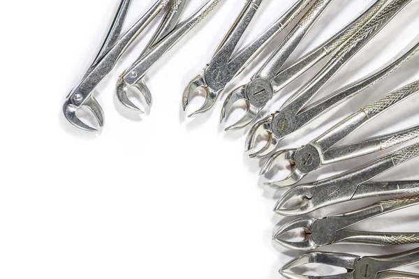 Dental Instruments arranged on white table. — Stock Photo, Image