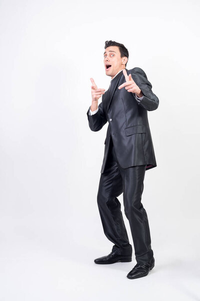 Satisfied man in suit. White background, full body