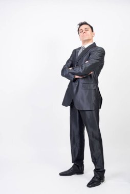 Arrogant man in suit. White background, full body clipart