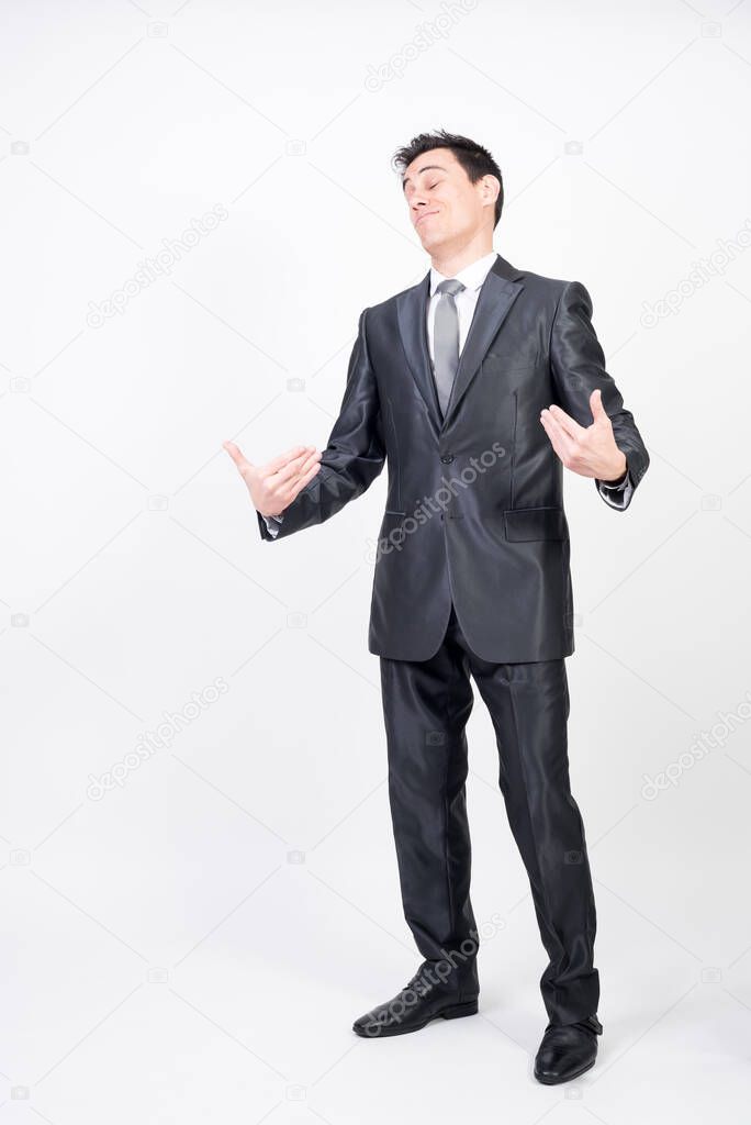 Arrogant man in suit. White background, full body