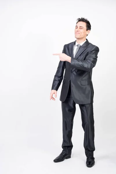 Smiling Man Suit Pointing Copy Space White Background Full Body Stock Picture