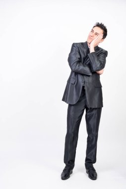 Takım elbiseli rüya adam. Beyaz arkaplan, tüm vücut