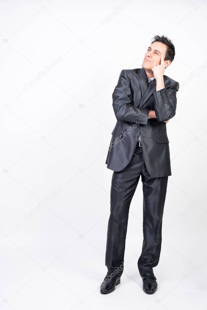 Dreamy man in suit. White background, full body