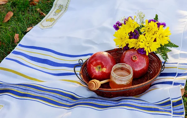 Jewish new year. Rosh Hashana apples, honey pomegranates  holiday