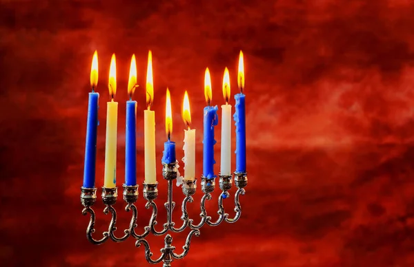 Jewish holiday Hanukkah creative background with menorah. View from above focus on . — Stock Photo, Image