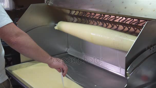 Cooking Traditional Lithuanian cake Baumkuchen is a kind of traditional layered — Stock Video