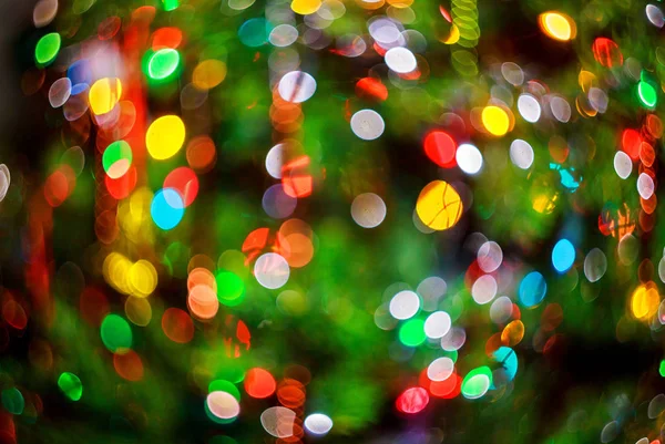 Lumières fond bokeh flou de la soirée de Noël pour votre conception — Photo