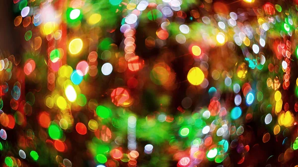 Lumières fond bokeh flou de la soirée de Noël pour votre conception — Photo