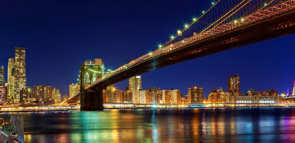 New York - Panoramic view of Manhattan Brooklyn Bridge by night, big size — Stock Photo, Image