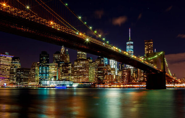 Brooklyn Bridge at dusk viewed from the Park in New York City.