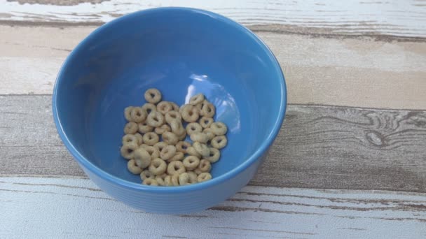 Corn flakes in a bowl. Shot with high speed camera, Slow Motion. — Stock Video