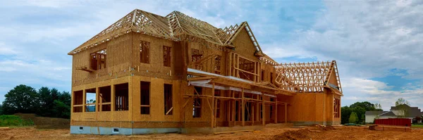 unfinished wood frame building or house