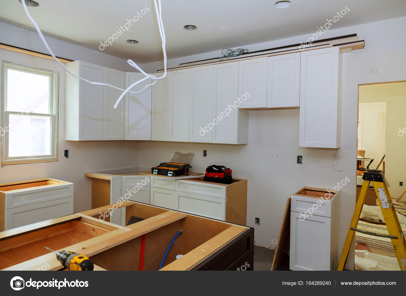 Installation Of Kitchen The Drawer In Cabinet Stock Photo