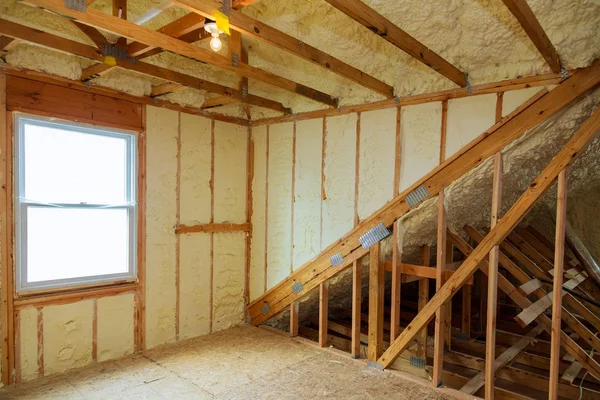 A room at newly constructed home is sprayed with liquid insulating foam — Stock Photo, Image