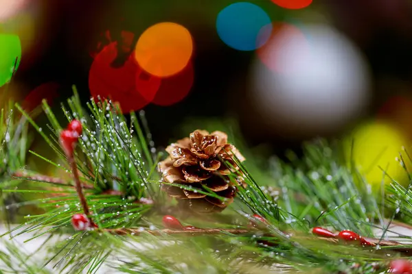 Christmas ornaments on old wooden table light bokeh — Stock Photo, Image