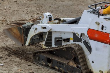 küçük Ekskavatör Bobcat adlı inşaat site Skid loader inşaat sitesinde
