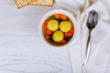 Delicious Matzoh ball soup with Matzah clipart