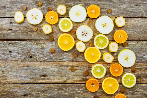 Citrus background. Citrus fruits. On wooden background.