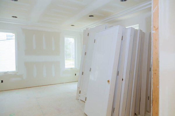 Construction building new home construction interior drywall tape. Building construction gypsum plaster walls