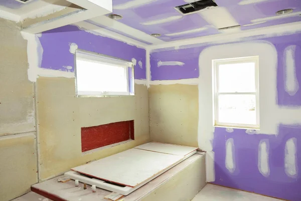 stock image New under construction bathroom interior with drywall and patching