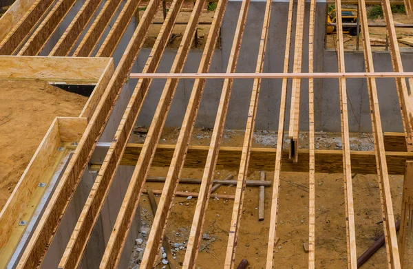 House framing floor construction showing joists trusses