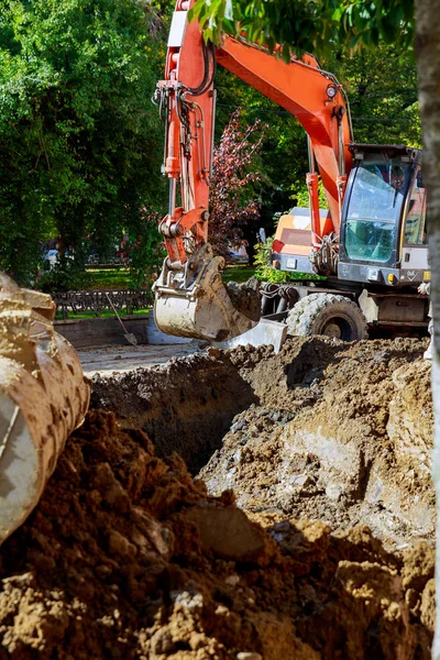 Outdoor work : Excavator digging to moving the soil in construction excavation work