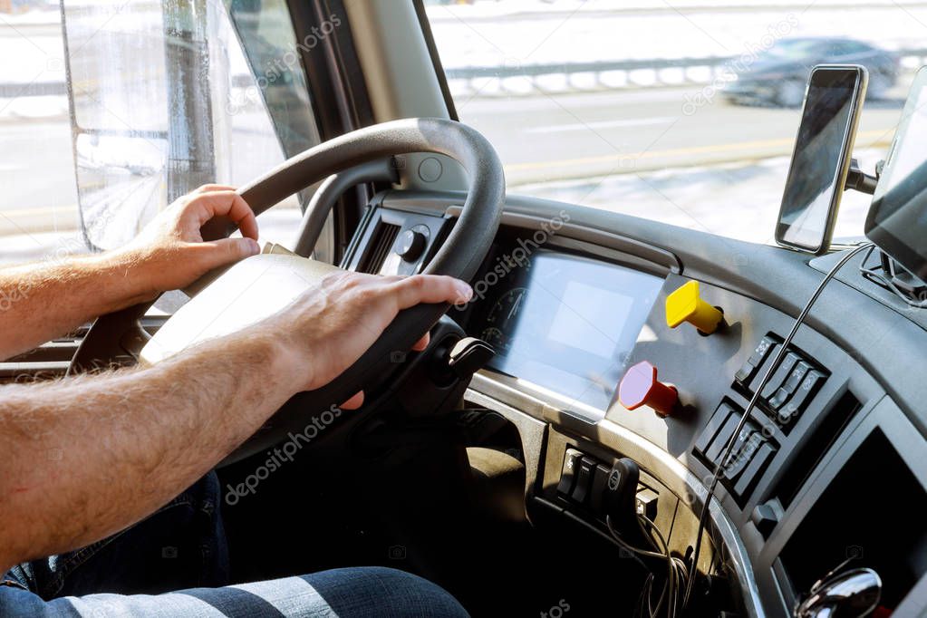 Truck drivers big truck driver's hands on big truck steering wheel