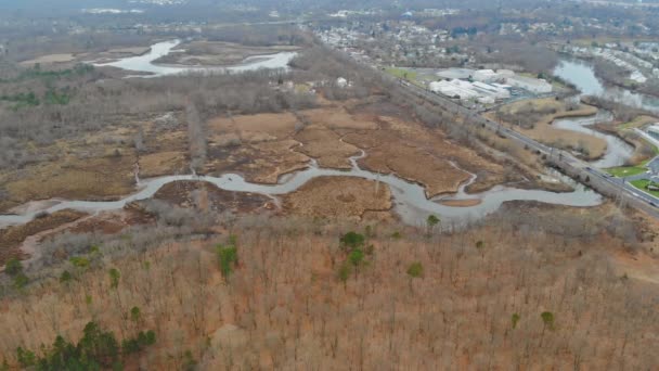 Aerial view of residential houses neighborhood and apartment building complex at housing development — Stock Video