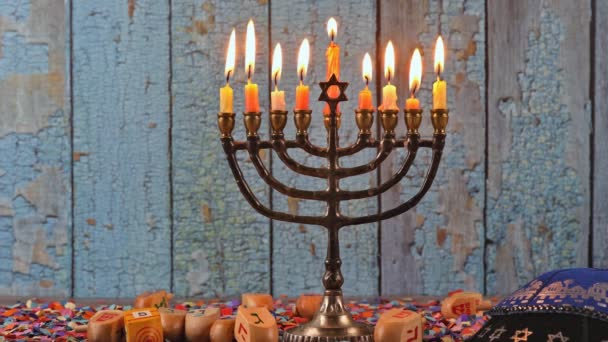 Jewish holiday olive oil Hanukah candles celebrating the menorah — Stock Video