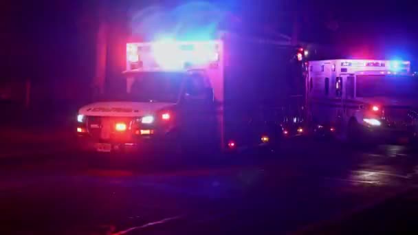 Ambulance street city 911 emergency on the roads, paramedics with flashing lights — Stock video