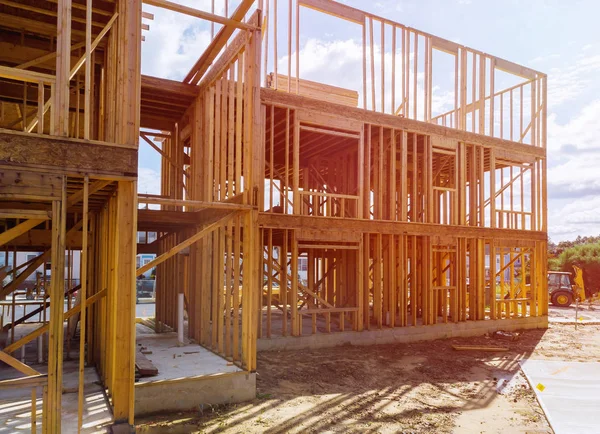 Beam stick built frame of a new house under construction Stock Image